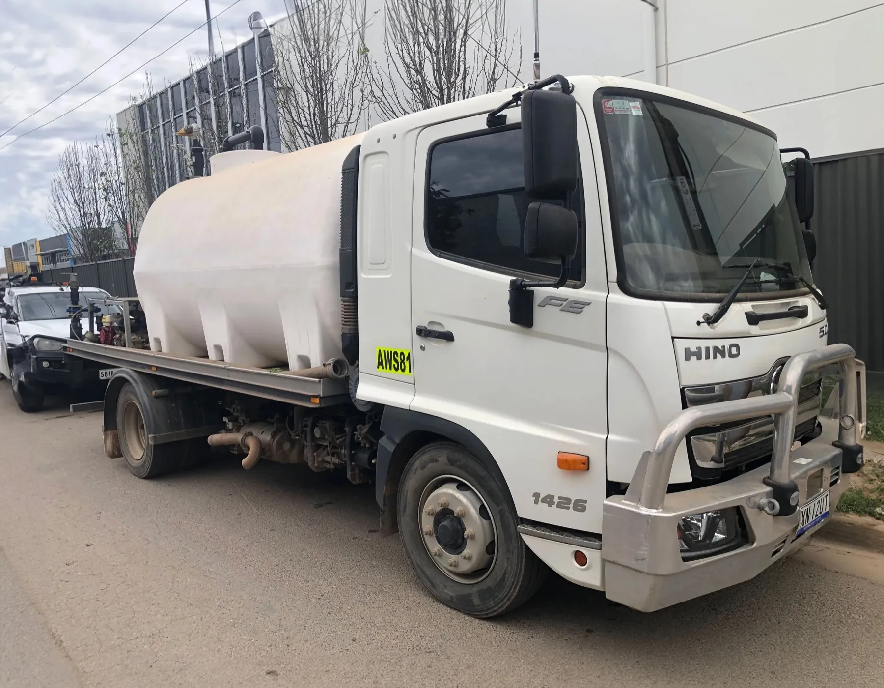 Their 8,000 litre Hino water truck, fitted with rear sprayers